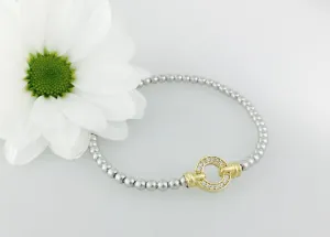 Exquisite Silver Designer Circle Bracelet. Yellow gold pave set circle
