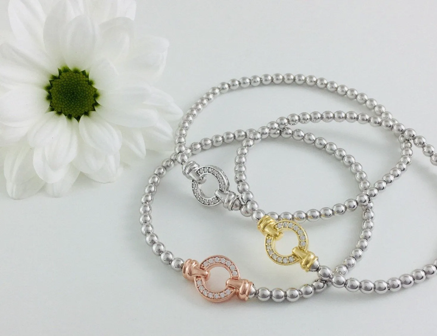 Exquisite Silver Designer Circle Bracelet. Yellow gold pave set circle