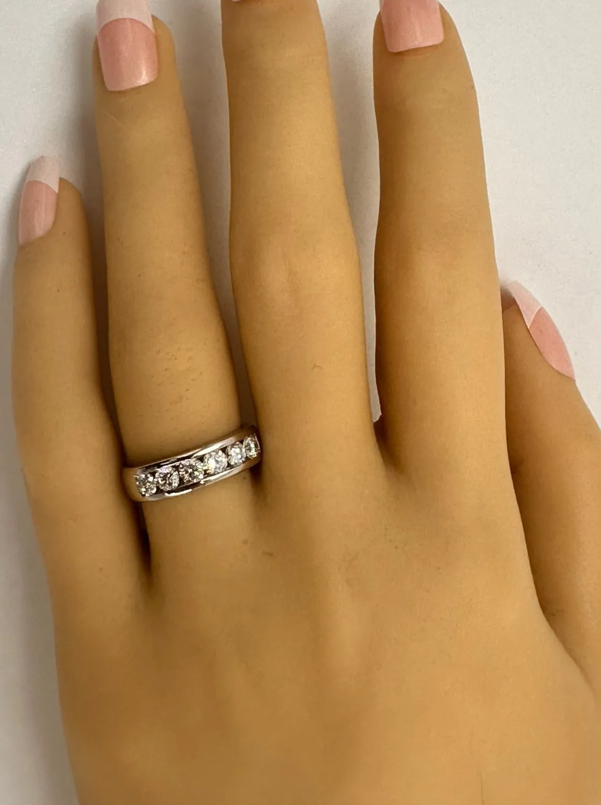 Luxurious White Gold Diamond Ring with Channel Set Brilliance